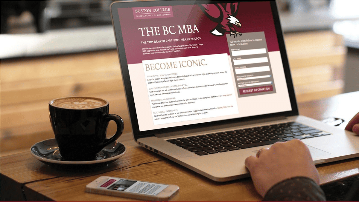 Person is sitting at a laptop displaying a digital landing page. The screen shows  information about the "BC MBA" with an open reply for more information form.