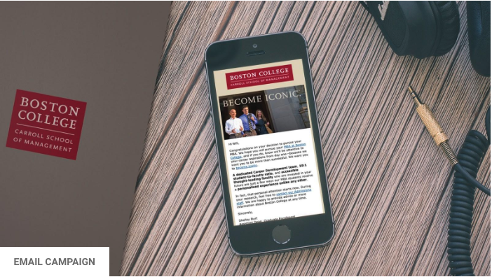  A smartphone displaying an email newsletter from Boston College's Carroll School of Management rests on a wooden surface. To the right side of the phone, there is a partially visible pair of black headphones and an audio cable. Text: "Email Campaign.